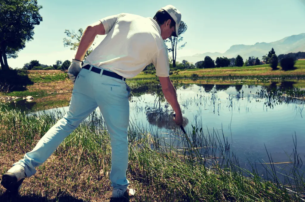 golfer looking for ball after golf shank