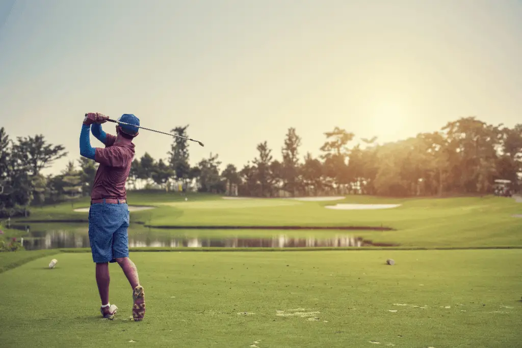 golfer swinging a golf club 