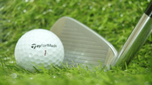 TaylorMade Iron against golf ball
